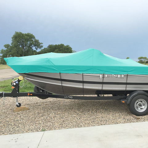 8x28 Foot Waterproof Shade Cloth With Grommets Sun Shade Sail Rectangle Turquoise 260 GSM covering a boat on a trailer