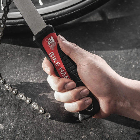 Hand holding chain whip from Two Tool Kit For Bike Cassette And Rotor Lockring With Chain Whip For Shimano SRAM And Center Lock Discs Easy Install