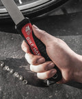 Hand holding chain whip from Chain Whip And Cassette Lockring Tool Kit For 7 8 9 10 11 12 Speed Shimano And Sram, rubber grip handle