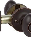 Carlyle Privacy Door Knob With Reversible Left Or Right Hand Fits Doors One And Three Eighths To One And Three Fourths Inch Thick Oil Rubbed Bronze Finish Bed And Bath Push Button Lock Easy To Install, showing side view