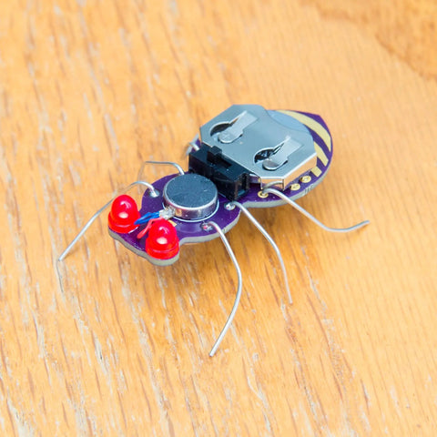 Jitterbug DIY Soldering Kit For Beginners Interactive Hands On Electronics Projects For Students And STEM Classes Includes Vibration Motor Circuits With Battery Bulk Educator Pack For Classroom Soldering Practice And Fun, assembled insect circuit with LEDs