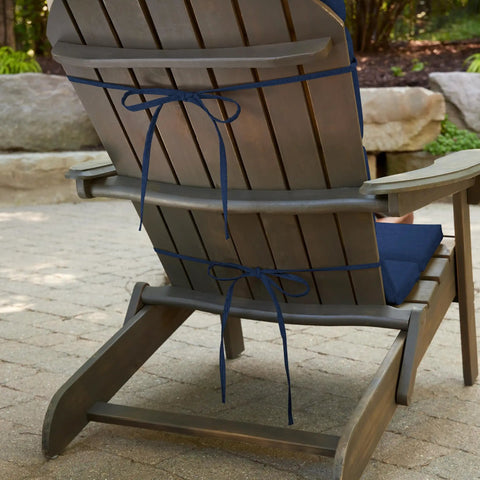 Back view of Outdoor Foam Adirondack Cushion For Chairs, 21.5 W X 50 L X 2.5 D, attached to chair in Sapphire Blue Leala