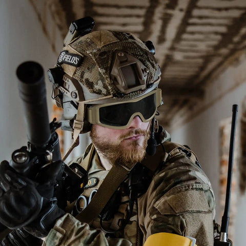Person wearing Fog Proof Airsoft Goggles With Interchangeable Lenses For Shooting And Outdoor Sports Tough Anti Fog Safety Glasses