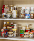 Cabinet shelves with clear 4 Pack Lazy Susan Organizer Set With Two 12 Inch High Edge Turntables storing jars and spices, 360 rotating