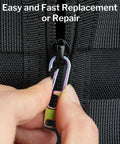 Hand using Beefed Up Heavy Duty Titanium Zipper Pull Replacement Kit on a black bag for easy zipper repair.