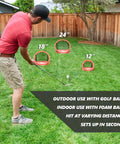 Man using Chipster Range Golf Chipping Practice Net Target System With Carrying Case Red Fast Popup Setup Three Target Zones