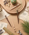 Tapestry Threading Tool Set With Four Wooden Tools Double Opening Design For Thick Yarn Rug Weaving Supplies With Smooth Tapered Points Durable Craft Kit For Quick Weaving And Shared Projects, four wooden tools on knitting table