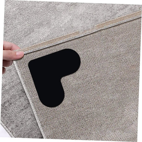 Heart Shaped Rug Tape Set 8 Pcs No Fuss Non Slip Double Sided Stickers For Area Rugs And Carpets Easy Install No Residue Safe On Laminate Floors Lightweight PU Material For Home Safety And Decoration, shown on rug corner.