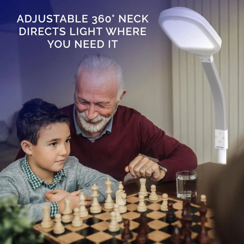 Lit Full Spectrum LED Floor Lamp with adjustable gooseneck lighting a chess game, enhances eye comfort for reading and crafts