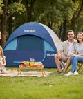 Family sitting outside Two Person Camping Tent With Quick Setup In Minutes Waterproof With Mesh Top And Ventilated Door Lightweight 4.4 Lb