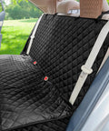 Waterproof Nonslip Pet Bench Seat Cover for Cars and SUVs installed on backseat, fits 52 inches wide, black quilted design