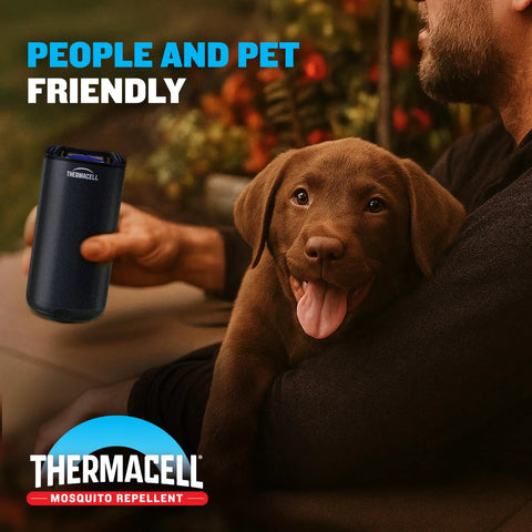 Person holding Fuel Zone Guard Base Mosquito Repeller 15 Foot Zone Of Scientifically Proven Outdoor Protection with dog