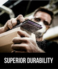 Person sanding wood with Pro Grade 9x11 Purple Sandpaper Set Of 20 120 Grit Clog Resistant abrasive, close-up shot