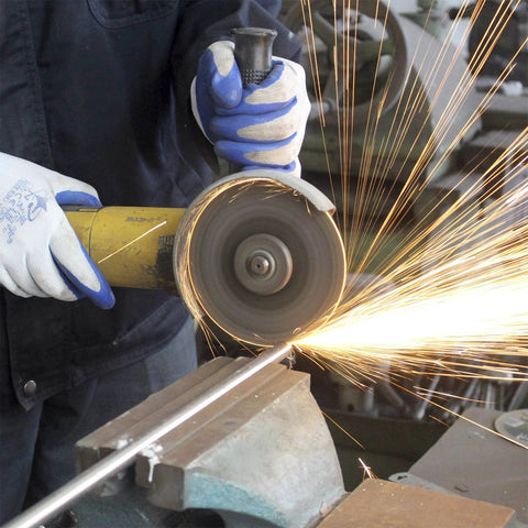 Merryland 5-inch metal cutting wheel on a yellow angle grinder used to cut metal rod; sparks fly.