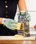 Using Cut Resistant Gloves Pro Grade Level 5 For Food Prep Ambidextrous And Machine Washable Ultra Comfortable Lightweight With 100 Percent Food Grade Safety Free Ebook Included while grating cheese.