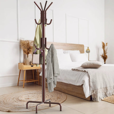 Standing Coat And Hat Rack With 12 Hooks Bronze Finish, Space Saving Organizer For Coats, Hats, Scarves, And Bags, in a bedroom