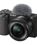 ZV-E10 Mirrorless Camera Bundle With 16 to 50mm Kit Lens And Forty Piece Accessory Bundle Including 64GB SD Card LED Light