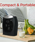 Compact Personal Space Heater With ESave Energy Saving Function on a table with fruit basket, ideal for office or home use.
