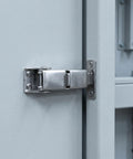 Stainless Steel Adjustable Toggle Latch Set With Heavy Duty Draw Clasp For Toolbox And Machinery Cabinets That Lock Tight Against Vibration And Rust installed on a grey cabinet door.