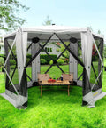 Front view of Six Sided Pop Up Gazebo Tent With Mesh Windows, Quick Set Up, 12x12 Foot Backyard And Camping Canopy Shelter in garden