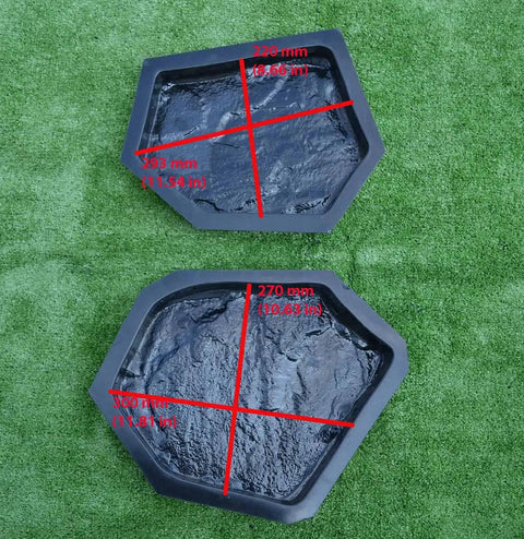 Two hexagonal ABS molds from Six Piece Concrete Molds Set For Flagstone Pavement Stones DIY Kit on grass background