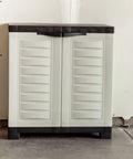 Beast Of A Heavy Duty Freestanding Resin Garage Storage Cabinet With Adjustable Shelf In Gray, front view in garage
