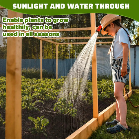 Child watering plants through Ultra Fine Nano PP Garden Netting 10 X 20 Ft Birdproof Barrier Screen For Veggies Fruits And Flowers