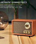 Retro Wood Bluetooth Radio With Built In Speakers And Wireless Streaming Walnut Finish on a wooden table