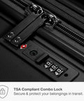 Close-up of TSA-compliant combo lock on black hardshell carry-on luggage zipper