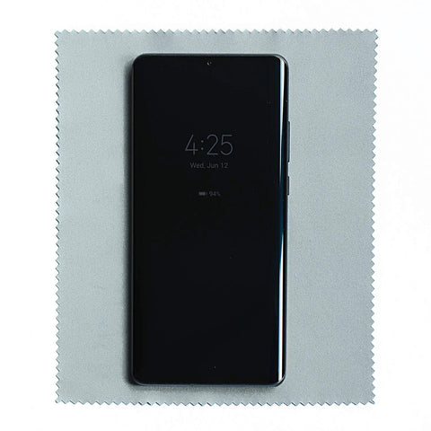 Gray microfiber cleaning cloth for glasses and screens, front view with a smartphone resting on top