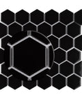 Dope Glossy Black Porcelain Hex Mosaic Tile For Floors And Walls, Mesh-Mounted 2 Inch Pieces, shown up close with high sheen