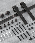 Orb Oil Rubbed Bronze Sliding Barn Door Hardware Kit With 6.6 Foot Track Rails Brushed Antique Bronze Finish shown uninstalled on wood surface.