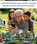 Family using Smart Bird Feeder With Camera 2K Live View Solar Powered Outdoor WiFi Night Vision AI Identify in a garden