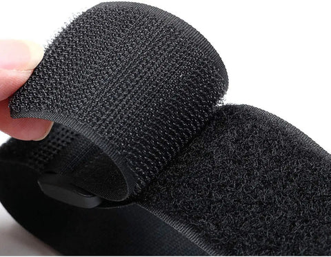Close-up of Pro Grade Reusable Hook And Loop Cinch Straps for Cables and Cords, showing black nylon material and adjustable design.