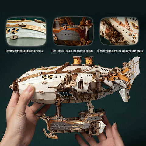 Hands holding Victorian Steampunk Airship 3D Puzzle Model DIY Kit For Adults With 648 Pieces, showcasing intricate details.