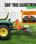 3 Point Rock Rake For Category 0 Tractors With 360 Degree Rotation attached to green tractor on grass