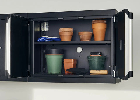 Open cabinet with various gardening pots, folded gloves, and a Tempered Steel Hand Trowel With Wood Handle 13 Inch Garden Tool