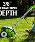 Person using a 10 Amp 14 Inch Corded Electric Dethatcher With Stainless Steel Tines For A Healthier Lawn on grass