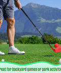 Person using the 4 Pack Backyard Golf Club Set For Kids And Adults, Adjustable Plastic Practice Clubs with ball on grass field