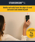 Badass Slick Wood and Metal Stud Finder with Edge Detection Wall Scanner in use against a drywall surface.