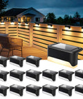Real Deal Solar Deck Lights For Outdoor Yard And Fence Featuring Waterproof 16 Pack Warm White 4 Led Bulbs on wooden railing at night