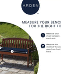 Weatherproof Outdoor Settee Cushion For Wicker Benches 41.5 By 18 Inches Fade Resistant Sapphire Blue UV Protected Outdoor Fabric PFAS Free Polyfill From Recycled Bottles Two Ties Fits Most Standard Outdoor Settees shown on a wooden bench in a garden setting.