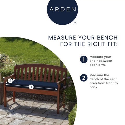 Weatherproof Outdoor Settee Cushion For Wicker Benches 41.5 By 18 Inches Fade Resistant Sapphire Blue UV Protected Outdoor Fabric PFAS Free Polyfill From Recycled Bottles Two Ties Fits Most Standard Outdoor Settees shown on a wooden bench in a garden setting.
