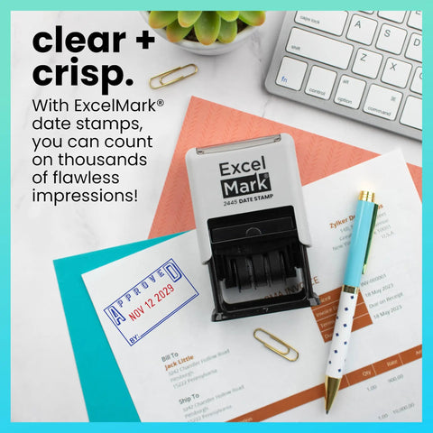 Badass Date Stamp Featuring Custom Text Options And Dual Blue Red Ink With A Legit Gray Mount on desk with documents.
