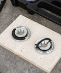 Dead On Tough 2Pcs Angle Grinder Flange Locking Nuts 5/8 Inch 11 Thread on a work surface for tool-free disc swaps.