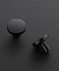 Matte Black One And A Quarter Inch Drawer Knobs Set Of 30 Solid Round Cabinet Knobs For Kitchen Cabinets And Dressers Durable Cupboard Hardware Easy Grip Modern Farmhouse Finish Ideal Drawer Pulls For Any Room shown on dark surface