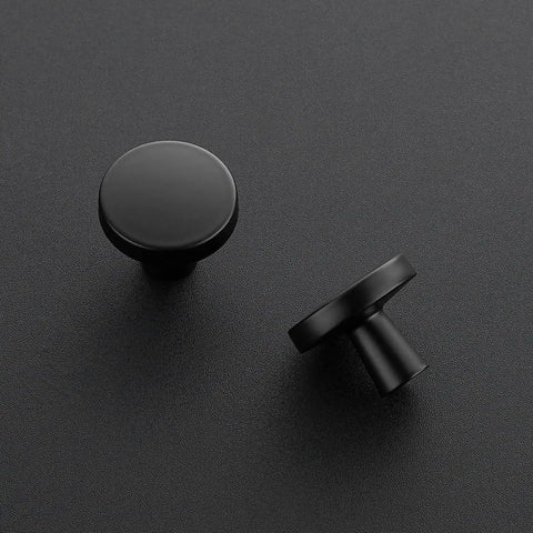 Matte Black One And A Quarter Inch Drawer Knobs Set Of 30 Solid Round Cabinet Knobs For Kitchen Cabinets And Dressers Durable Cupboard Hardware Easy Grip Modern Farmhouse Finish Ideal Drawer Pulls For Any Room shown on dark surface