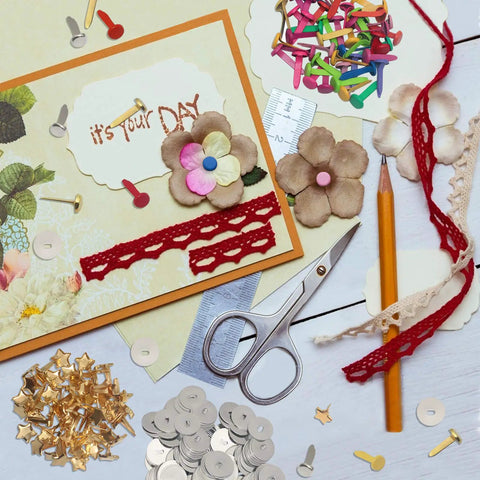 Craft table with 200 Piece Colorful Mini Paper Brads With Silver Washers And Hole Punch Pliers Set for DIY and card making