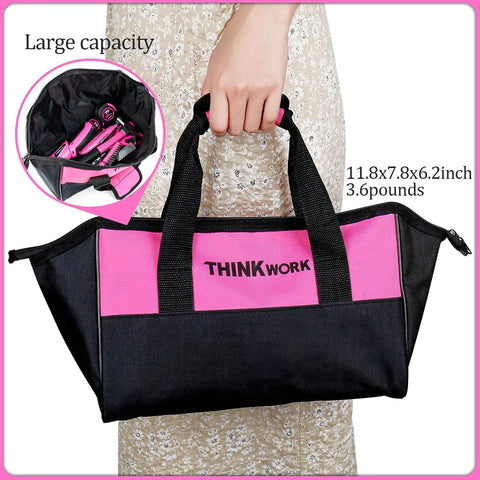Pink Tool Set For Women 122 Piece With 3.6V Rotatable Electric Screwdriver Easy Carry Round Pouch displayed on floral dress, large capacity bag