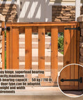 Wooden gate with Two Pack 15 Inch Heavy Duty T Shape Strap Hinges With Screws Black Wrought Iron Spade Tip installed on brick entrance